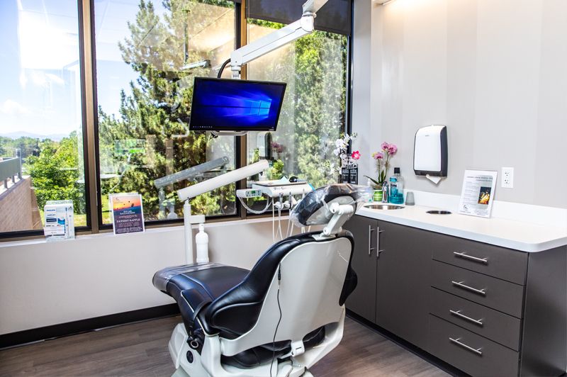 A treatment room at Cherry Creek Dental Spa equipped with modern dental technology